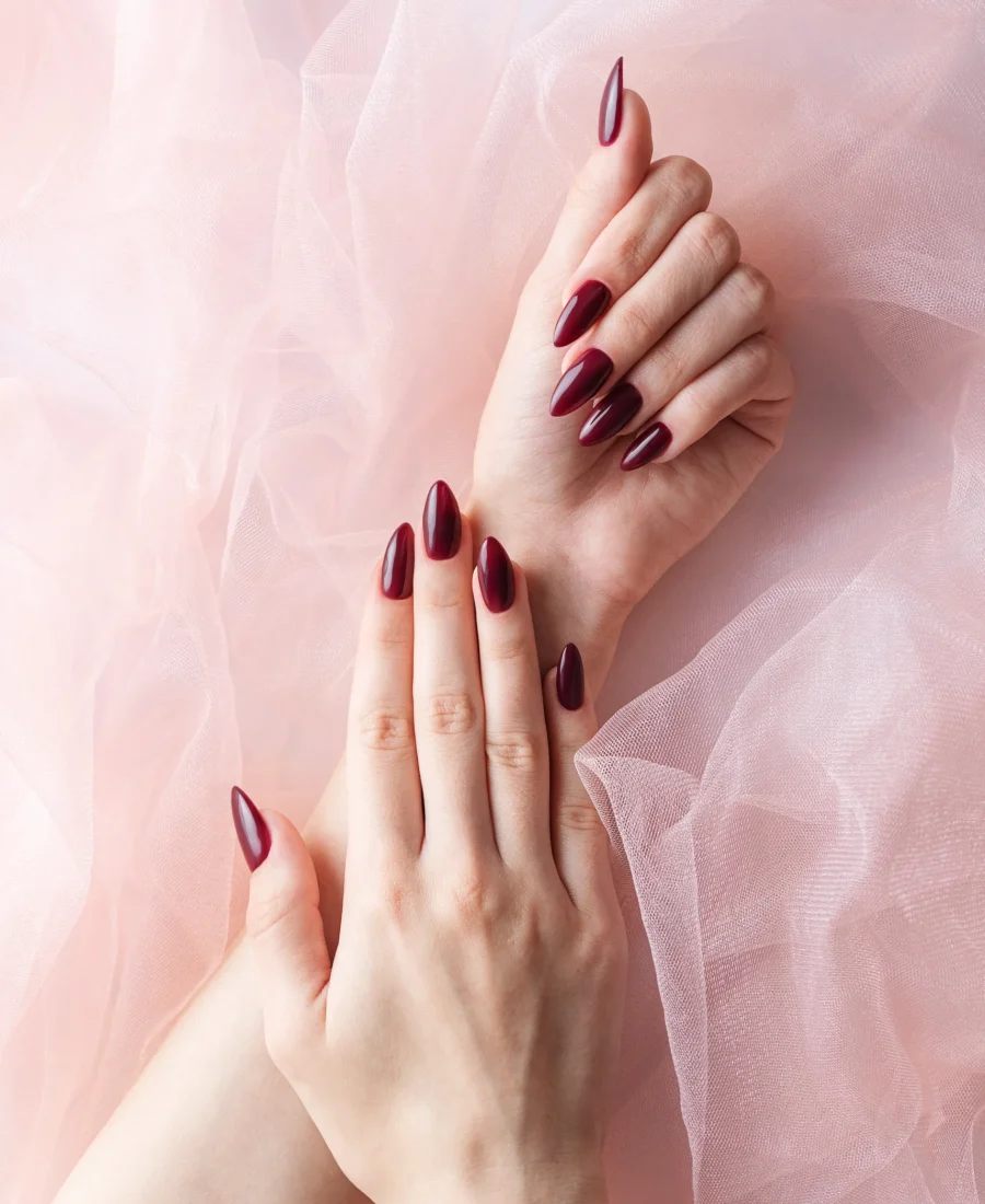 hands-of-a-young-woman-with-dark-red-manicure-on-n-2026-01-07-05-57-48-utc
